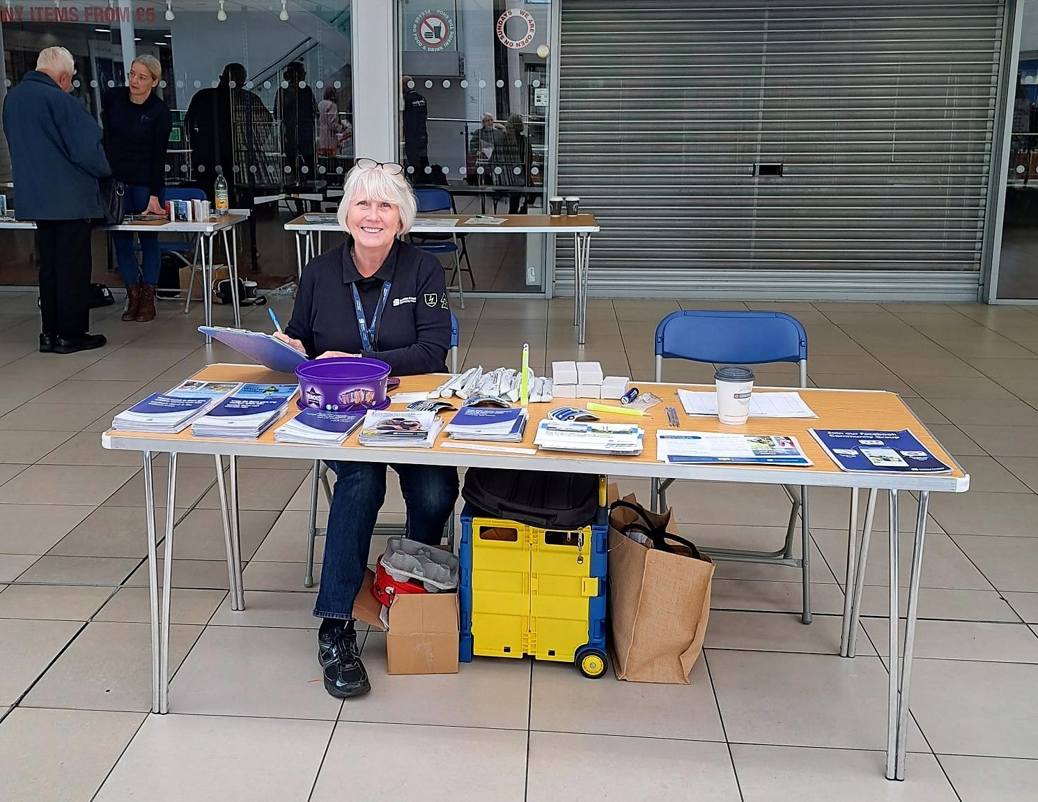 SSEN female worker at stand with leaflets