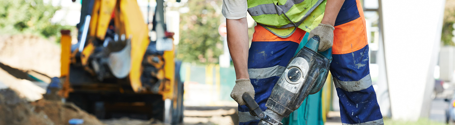 Worker using hand tool 